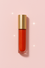 Gloss Volumizzante Effetto WOW – Labbra piene e brillanti in 60s